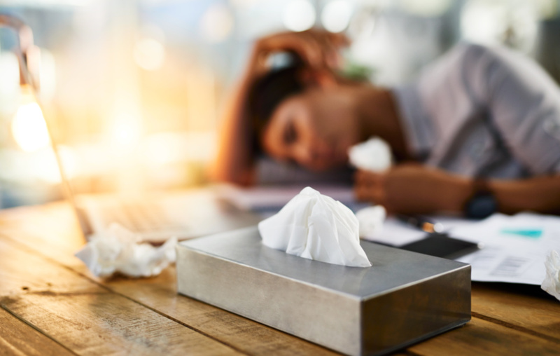 3929 mp66105075 person sleeping and sick in office with tissues fatigue