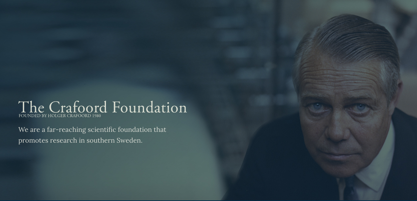 Logotype and a man. Photo.