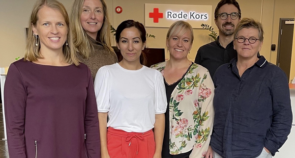 Group photo of people representing the Red Cross.