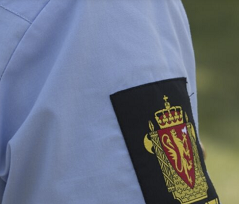 Close up of the logo on a sleeve belonging to a police.